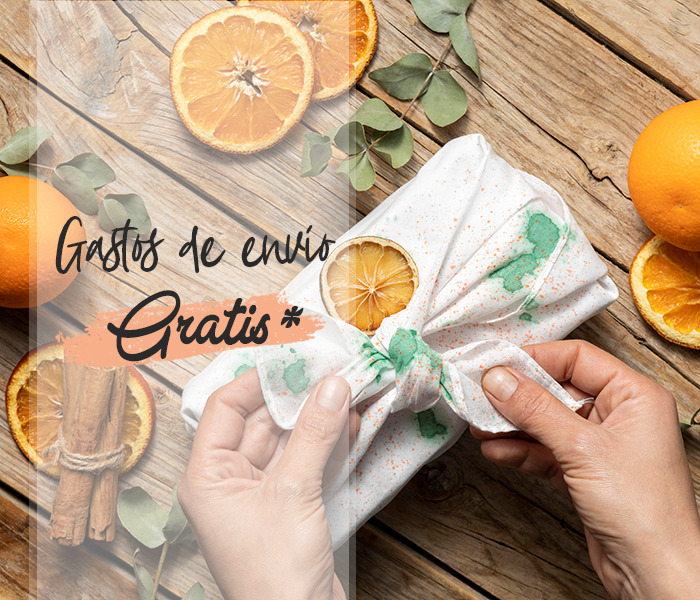 packaging artesanal con tela y naranjas secas